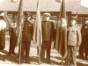 М.Г. Кудрявцев (слева со знаменем)